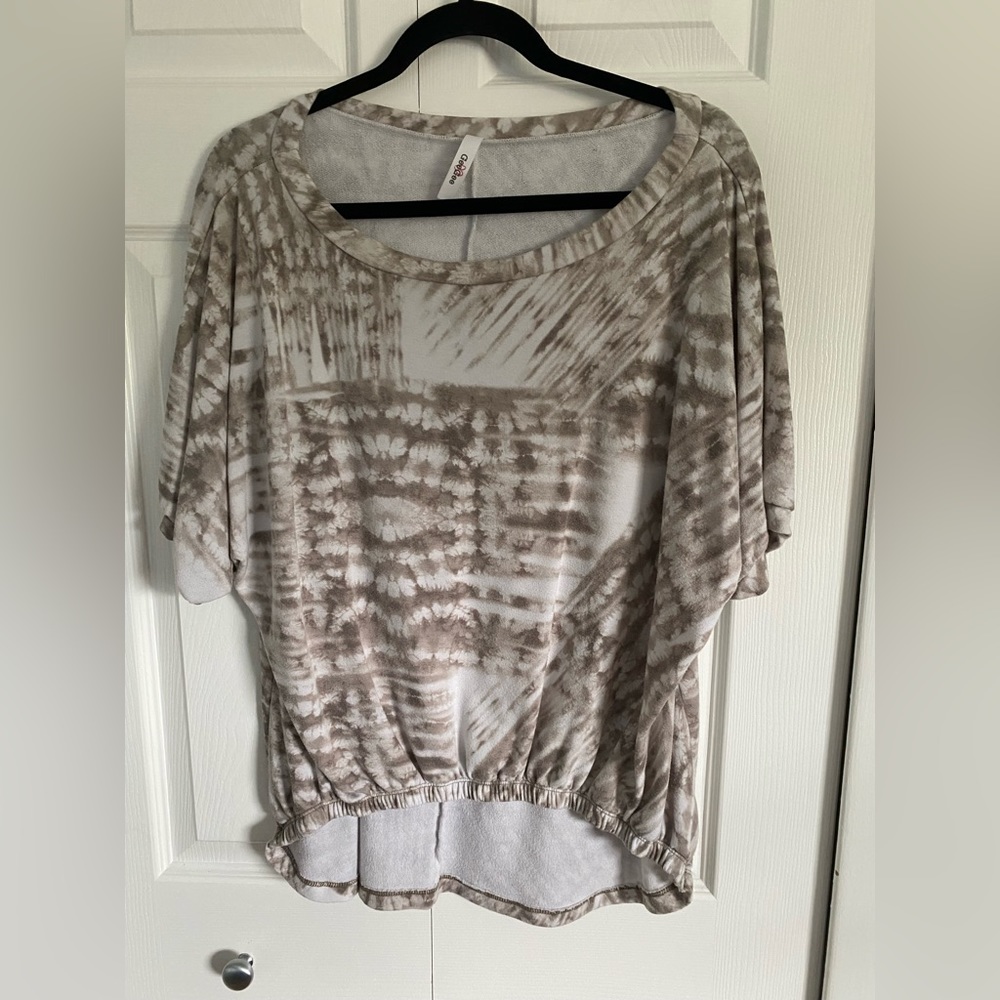 Ladies, short sleeve tunic longer and back and gathered waist short sleeve